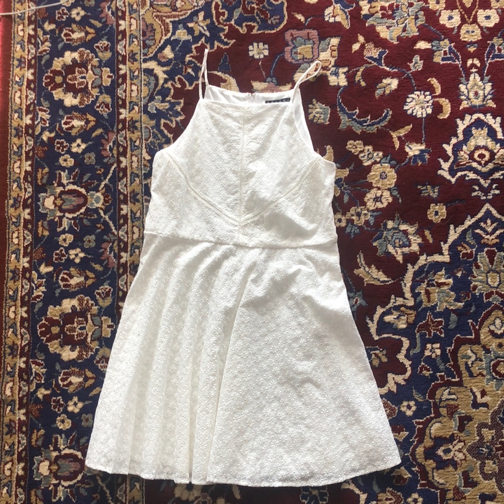 Textured white dress with back zipper. Never worn